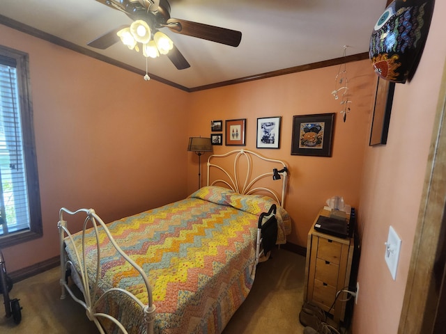 5005 S Brye Rd, Ludington, MI 49431 - bedroom with carpet, crown molding, multiple windows, ceiling fan, and baseboards