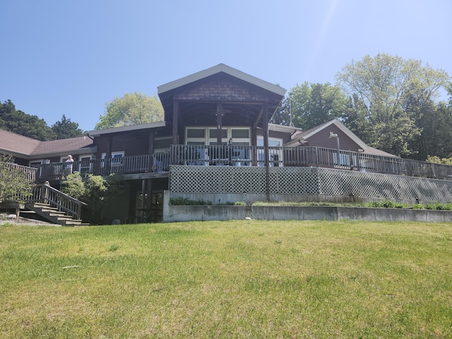5005 S Brye Rd, Ludington, MI 49431 - back of property with a lawn and a deck