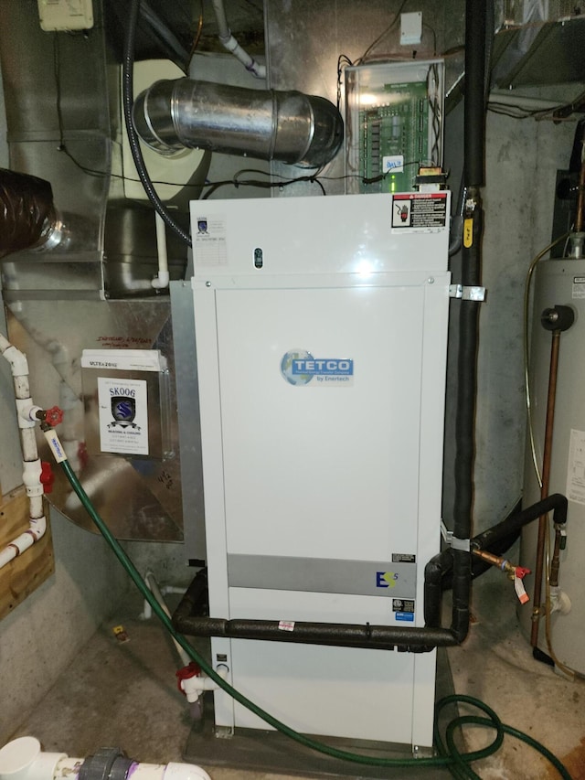 5005 S Brye Rd, Ludington, MI 49431 - utility room with water heater