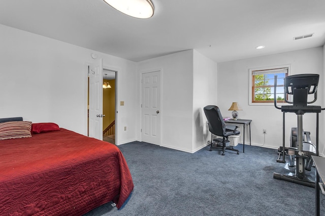 8595 Rives Junction Rd, Rives Junction, MI 49277 - carpeted bedroom featuring baseboards and an office area