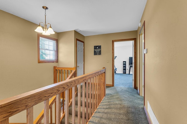 8595 Rives Junction Rd, Rives Junction, MI 49277 - hallway with an upstairs landing, carpet floors, and baseboards