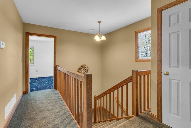 8595 Rives Junction Rd, Rives Junction, MI 49277 - corridor with an upstairs landing, carpet floors, and plenty of natural light