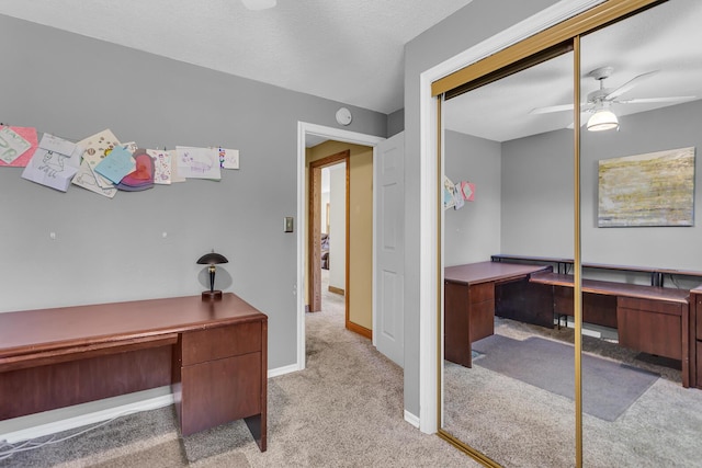 8595 Rives Junction Rd, Rives Junction, MI 49277 - office space with carpet floors, ceiling fan, and baseboards