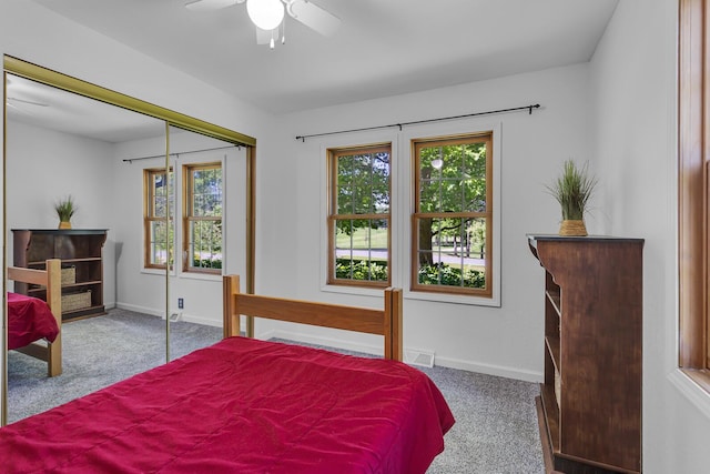 8595 Rives Junction Rd, Rives Junction, MI 49277 - carpeted bedroom featuring baseboards, a closet, and ceiling fan
