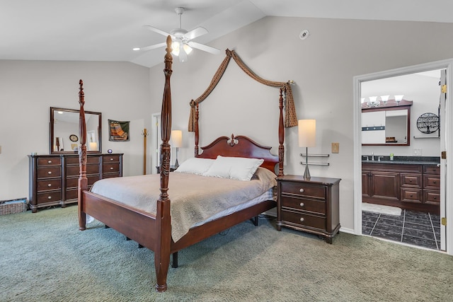 8595 Rives Junction Rd, Rives Junction, MI 49277 - carpeted bedroom with lofted ceiling, a sink, ensuite bathroom, and a ceiling fan