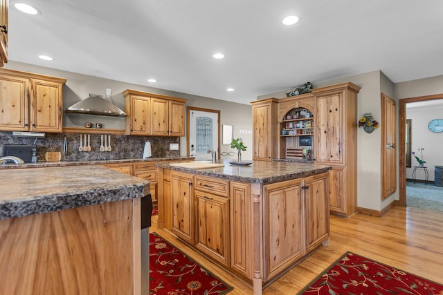 8595 Rives Junction Rd, Rives Junction, MI 49277 - kitchen with open shelves, a sink, light wood finished floors, a kitchen island with sink, and recessed lighting