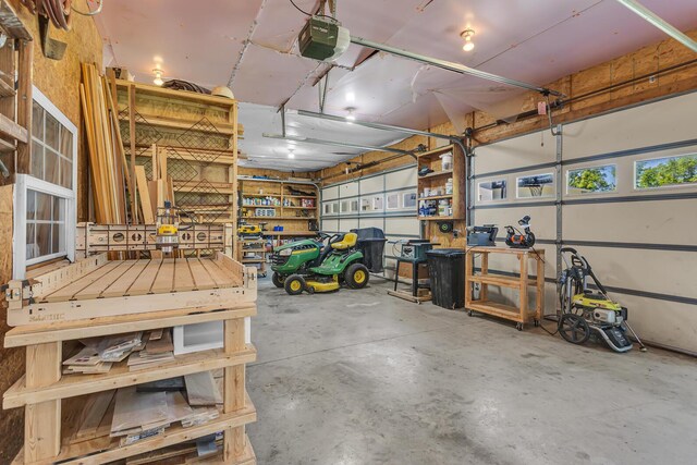 8595 Rives Junction Rd, Rives Junction, MI 49277 - garage featuring a garage door opener