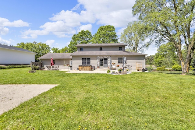 8595 Rives Junction Rd, Rives Junction, MI 49277 - rear view of house featuring a patio and a hot tub