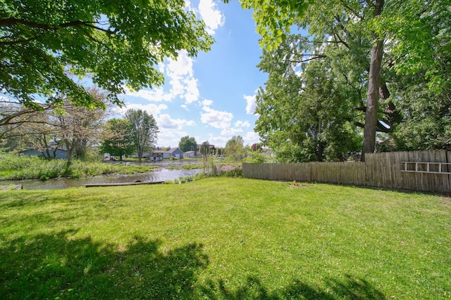 view of yard with a water view