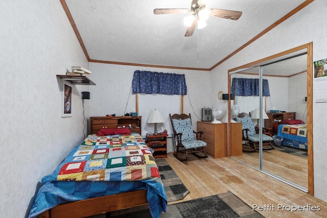 1633 Lavender Dr, Hastings, MI 49058 - bedroom with a textured ceiling, lofted ceiling, ornamental molding, a closet, and ceiling fan