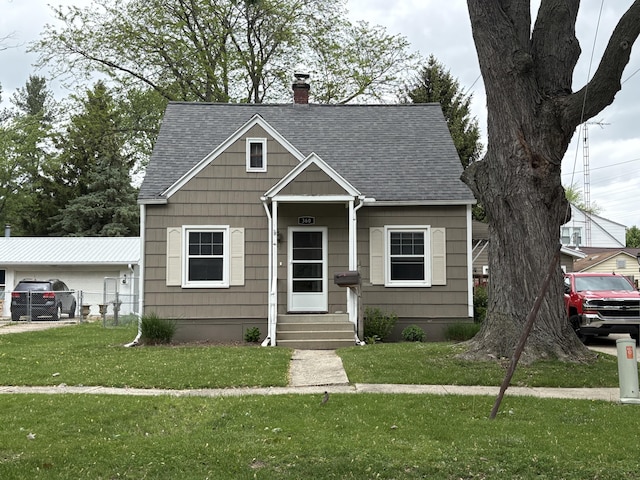 360 Rogers Rd, Adrian, MI 49221 - view of front of house with roof with shingles, a chimney, and entry steps