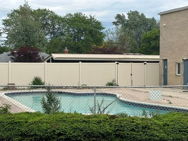 7350 N Inkster Rd Unit 10, Dearborn Heights, MI 48127 - view of pool featuring fence