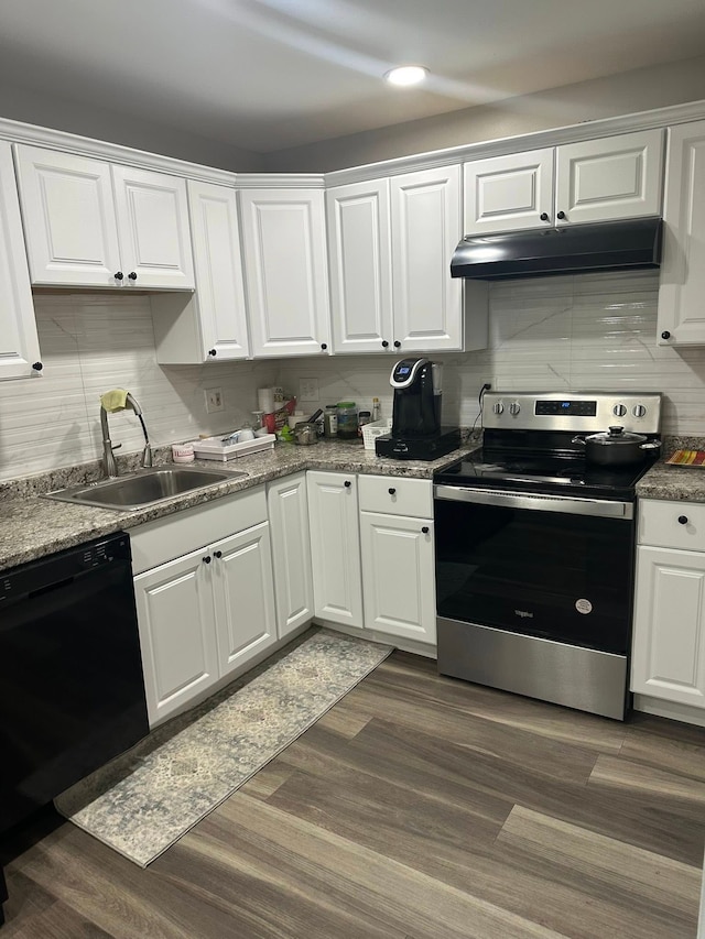 7350 N Inkster Rd Unit 10, Dearborn Heights, MI 48127 - kitchen with stainless steel range with electric cooktop, a sink, under cabinet range hood, dishwasher, and white cabinetry