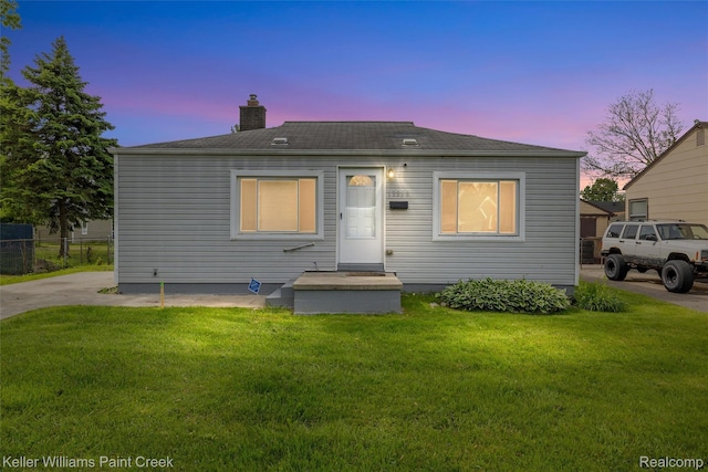 13350 Sidonie Ave, Warren, MI 48089 - view of front of house featuring a chimney and a shingled roof
