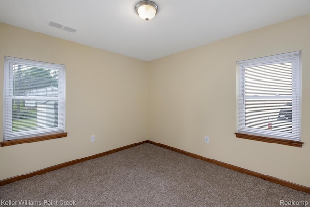 13350 Sidonie Ave, Warren, MI 48089 - spare room with carpet flooring and baseboards