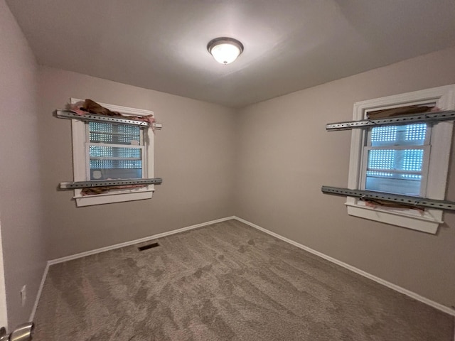 18989 Washtenaw St, Harper Woods, MI 48225 - empty room featuring baseboards and carpet