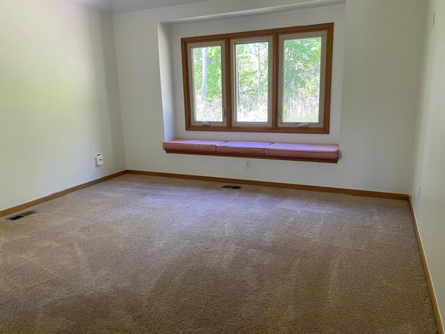 28379 Emerald Ct, Chesterfield, MI 48047 - empty room featuring baseboards and carpet flooring