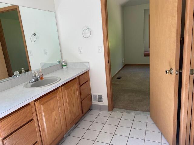 28379 Emerald Ct, Chesterfield, MI 48047 - bathroom with vanity and tile patterned floors