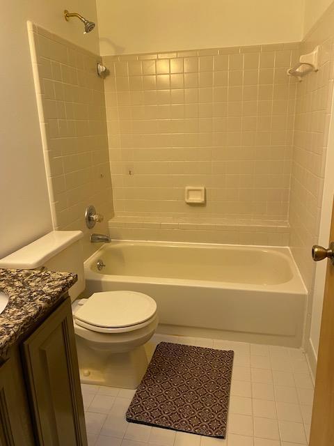28379 Emerald Ct, Chesterfield, MI 48047 - full bath featuring tile patterned flooring, toilet, shower / washtub combination, and vanity