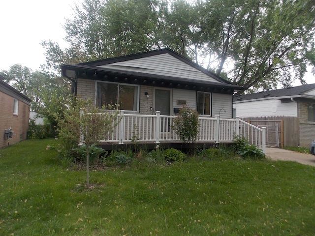 19526 Broadacres St, Clinton Township, MI 48035 - view of front facade with a front yard and a deck