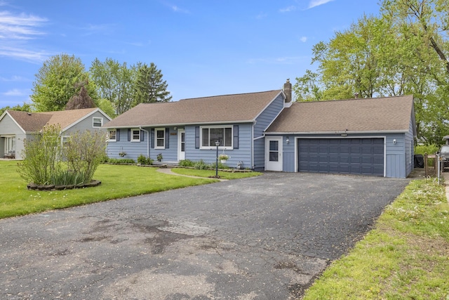 12550 Devoe St, Southgate, MI 48195 - ranch-style home with a garage, asphalt driveway, a chimney, and a front yard
