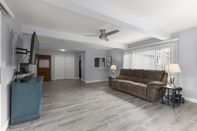 12550 Devoe St, Southgate, MI 48195 - living area with baseboards, light wood-style floors, and ceiling fan