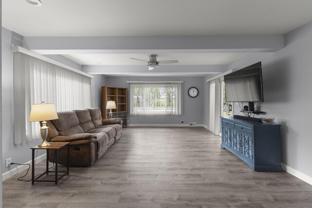 12550 Devoe St, Southgate, MI 48195 - living room with baseboards, a ceiling fan, and wood finished floors