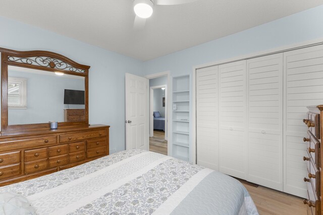 12550 Devoe St, Southgate, MI 48195 - bedroom with wood finished floors, a closet, and ceiling fan