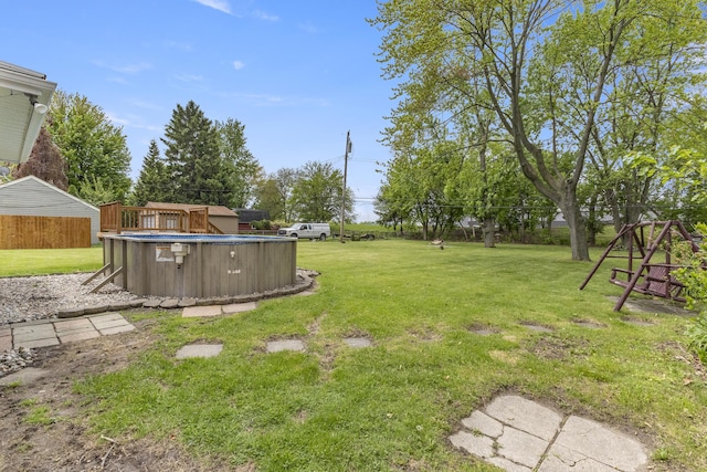 12550 Devoe St, Southgate, MI 48195 - view of grassy yard featuring an outdoor pool