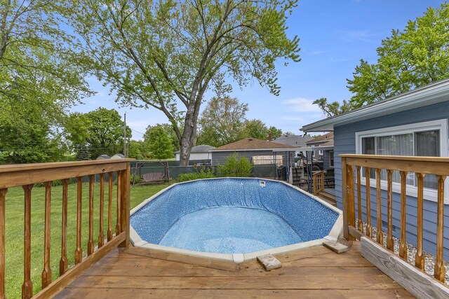 12550 Devoe St, Southgate, MI 48195 - view of swimming pool with a wooden deck