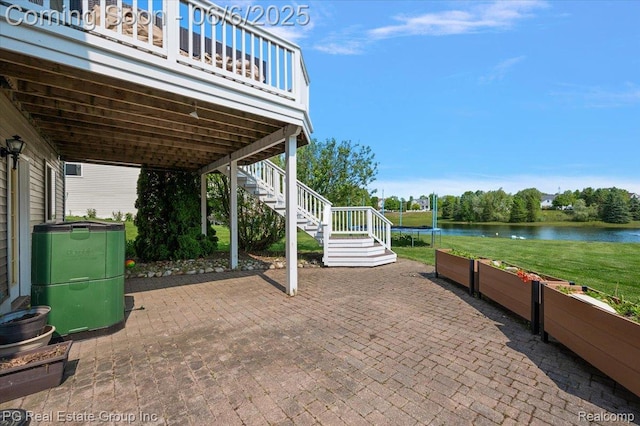 1226 Fountain View Ln, Oxford, MI 48371 - view of patio / terrace with stairs and a water view