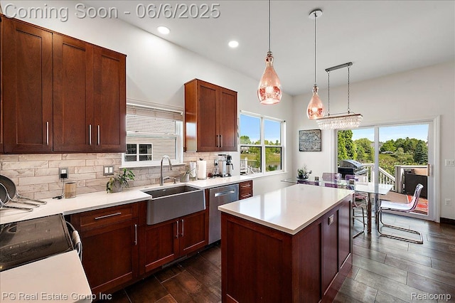 1226 Fountain View Ln, Oxford, MI 48371 - kitchen featuring stainless steel dishwasher, a sink, tasteful backsplash, recessed lighting, and light countertops
