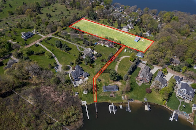 11400 Hillman, Davisburg, MI 48350 - aerial view of residential area with a nearby body of water and property boundaries highlighted