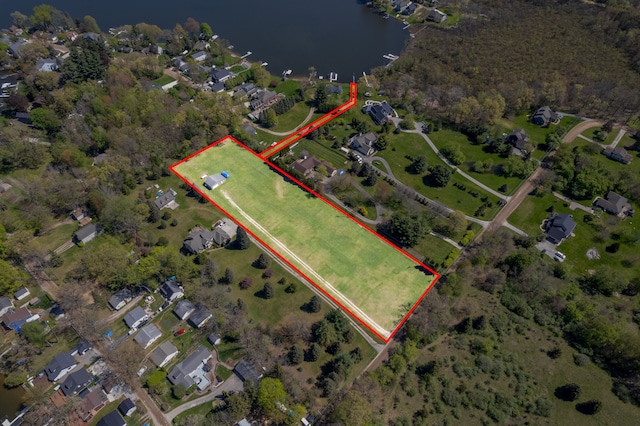 11400 Hillman, Davisburg, MI 48350 - aerial view of property and surrounding area featuring property boundaries highlighted and a large body of water