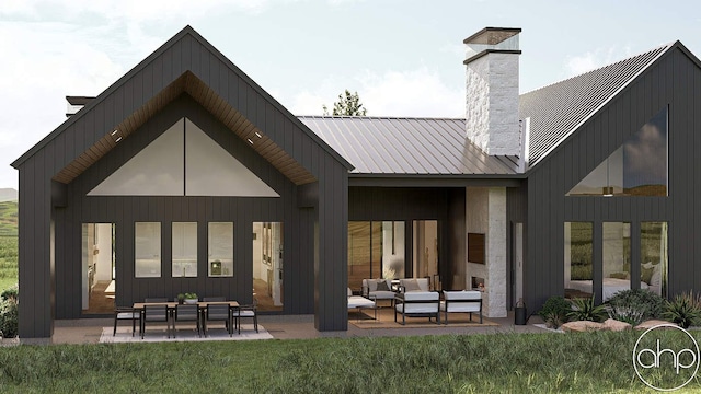 11400 Hillman, Davisburg, MI 48350 - rear view of house with a chimney, outdoor lounge area, a patio area, and metal roof
