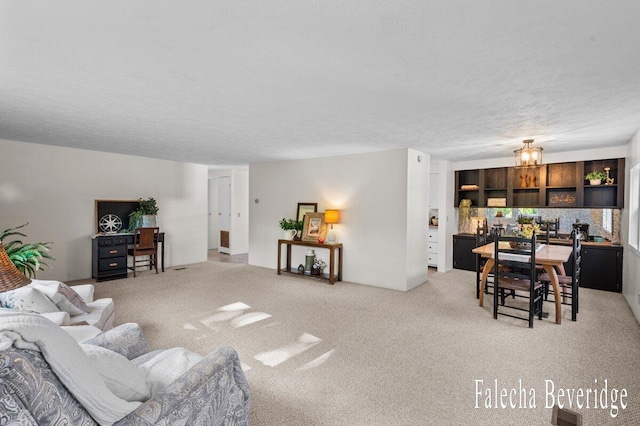 914 32nd St, Allegan, MI 49010 - living room featuring light carpet and a textured ceiling