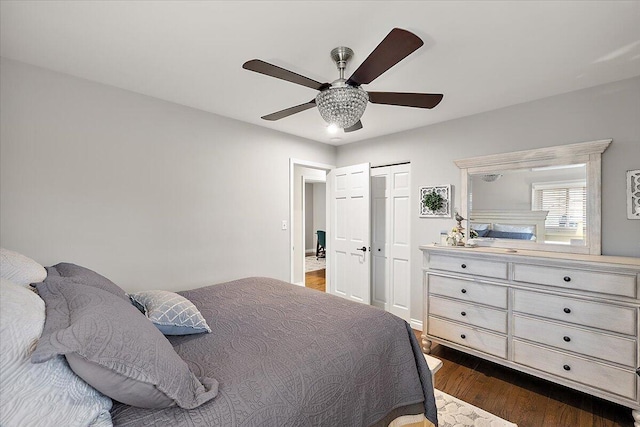53383 Starlite Dr, Michigan, MI 48316 - bedroom with dark wood-type flooring, a ceiling fan, and a closet