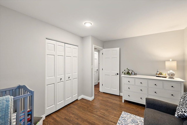 53383 Starlite Dr, Michigan, MI 48316 - bedroom with dark wood-style flooring, baseboards, and a closet