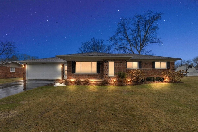 53383 Starlite Dr, Michigan, MI 48316 - view of front of property featuring driveway, an attached garage, a lawn, and brick siding