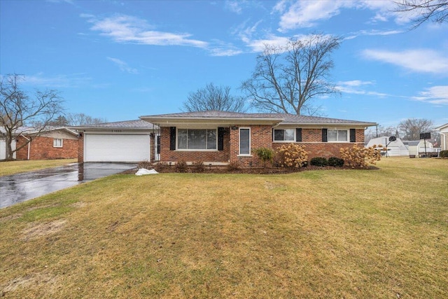 53383 Starlite Dr, Michigan, MI 48316 - ranch-style home with an attached garage, concrete driveway, brick siding, and a front lawn
