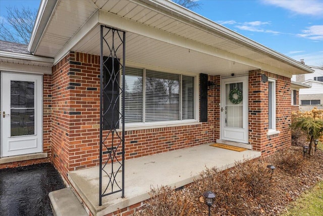 53383 Starlite Dr, Michigan, MI 48316 - entrance to property with brick siding and a porch