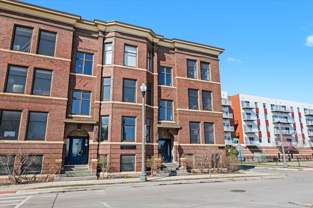 112 Watson St Unit 28, Detroit, MI 48201 - view of building exterior featuring entry steps