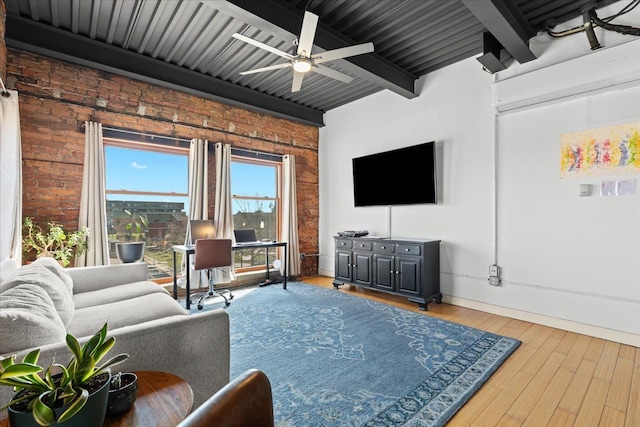 112 Watson St Unit 28, Detroit, MI 48201 - living room featuring brick wall, beam ceiling, ceiling fan, hardwood / wood-style flooring, and baseboards