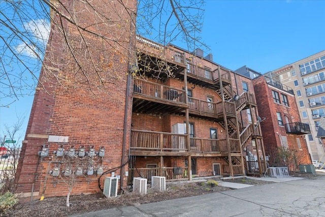 112 Watson St Unit 28, Detroit, MI 48201 - view of apartment building / complex featuring central AC