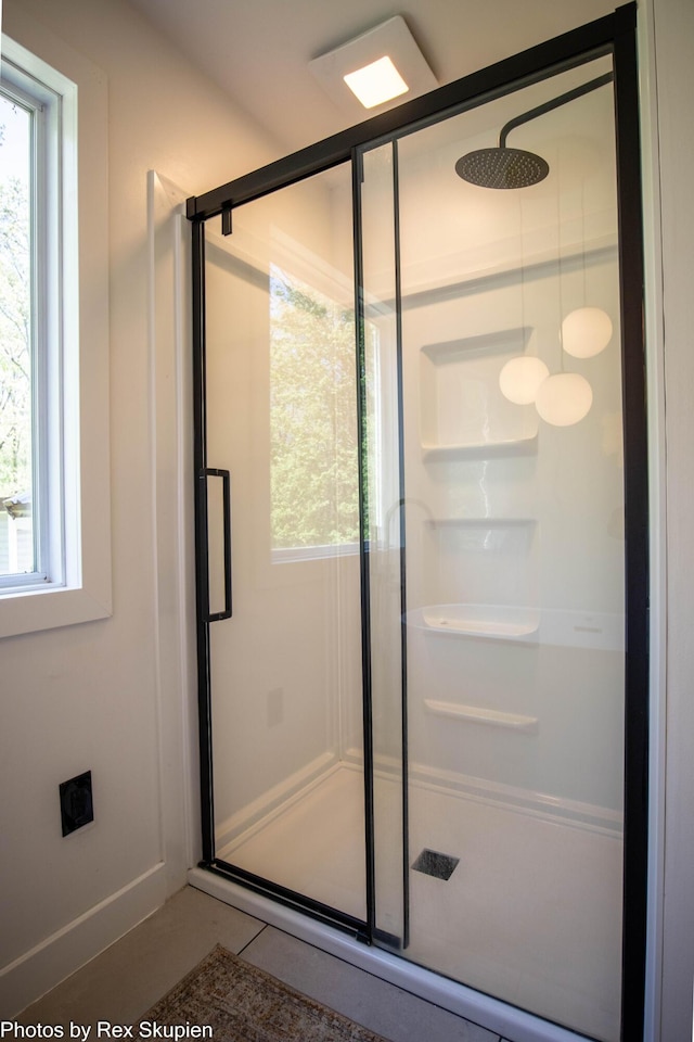 2490 S Parsons Ave, Fremont, MI 49412 - bathroom featuring a stall shower and tile patterned floors