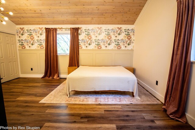 2490 S Parsons Ave, Fremont, MI 49412 - bedroom with crown molding, wallpapered walls, a wainscoted wall, wood ceiling, and dark wood finished floors