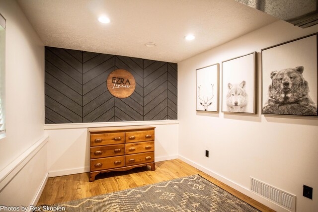 2490 S Parsons Ave, Fremont, MI 49412 - detailed view of wood finished floors, recessed lighting, and baseboards