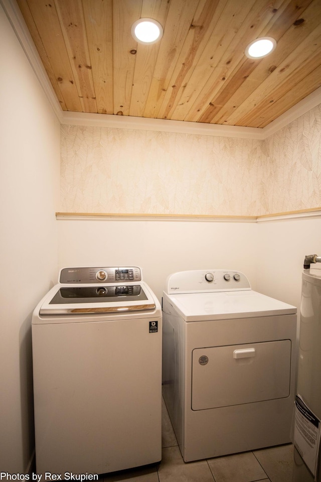 2490 S Parsons Ave, Fremont, MI 49412 - laundry area featuring wood ceiling, independent washer and dryer, water heater, and tile patterned floors