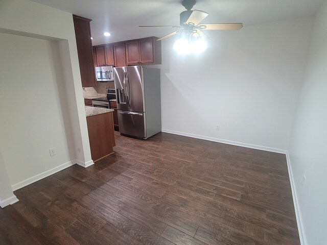 417 Prospect Unit # 210, Romeo, MI 48065 - kitchen with stainless steel appliances, a ceiling fan, dark wood finished floors, baseboards, and recessed lighting