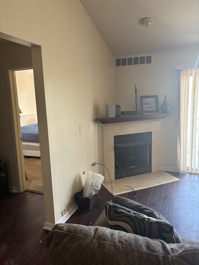 836 Brandon Ave, Pontiac, MI 48340 - living room with a premium fireplace, wood finished floors, and baseboards